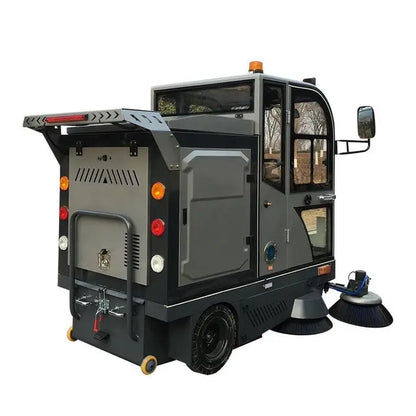 Automatic ride on sweeper truck