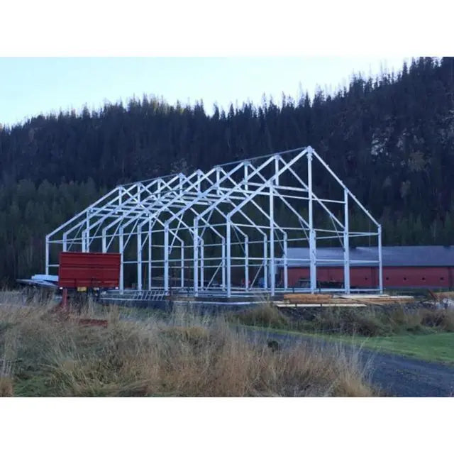 Steel Building Storage / Warehouse with electric overhead door 65′ X 33′ X 23′ (SBW-65)